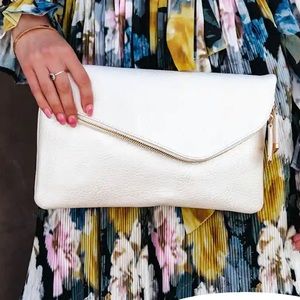 VICI large clutch. NWT. Slight shimmer to the pearl color.